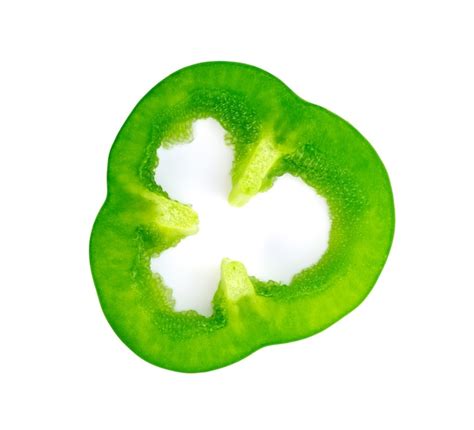 Premium Photo Sliced Green Pepper Isolated On White
