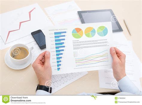 Businessman Analyzing Information On The Chart Stock Photo - Image of ...