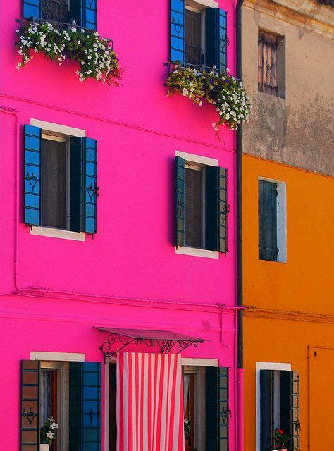 Hot Pink Building With Cute Flowered Window Boxes Pink House Exterior
