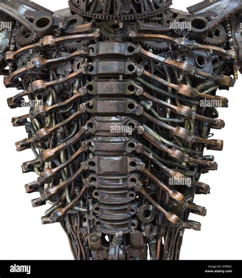 Closeup Body Of Metallic Robot Made From Auto Parts With Machinery