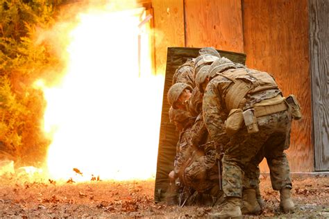 Marines Take Cover Behind A Blast Blanket As Detonation Cord Ignites