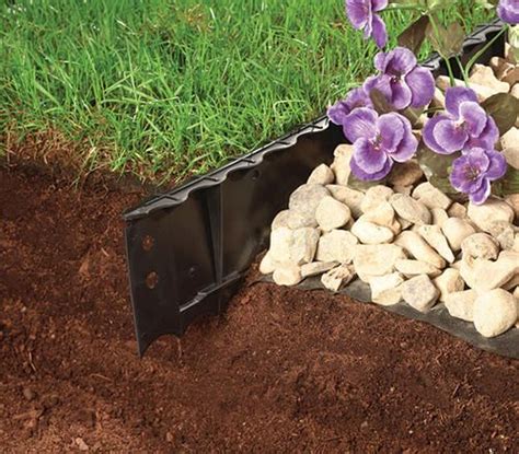 This landscape edging is extruded out of a machine, forming a solid, strong, continuous concrete edging. 4' Poundable Edging at Menards | Landscape edging ...