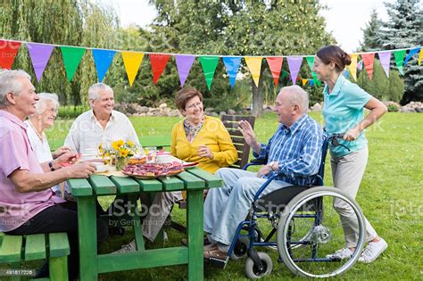 Find out where to watch online amongst 45+ services including netflix, hulu, prime video. Group Of Elderly People Sitting At The Garden Table Stock ...