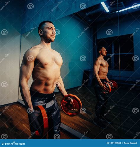 Muscular Bodybuilder Men Doing Exercises In Gym Naked Torso Toned Image Stock Photo Image Of