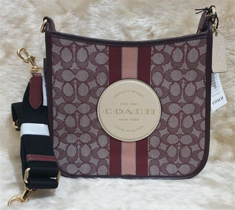 Coach Dempsey File Bag On Carousell