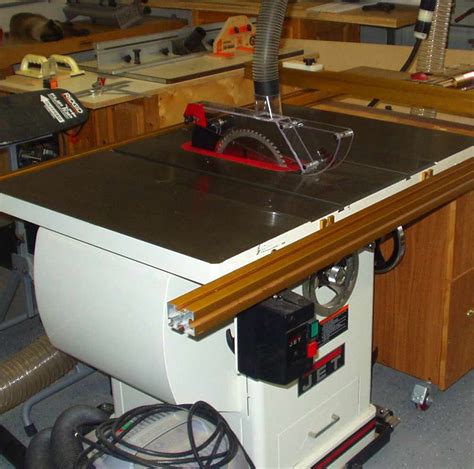 It includes independent sides and full 4 dust collection. GeezerTalk: Table Saw Blade Guard/Dust Collector, mark2
