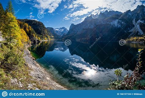 Autumn Alps Mountain Lake With Clouds Reflections Gosauseen Or