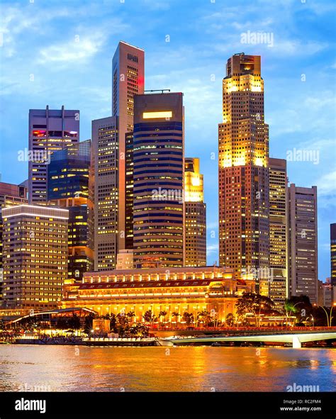 Evening Cityscape Of Singapore Downtown Core With Modern Architecture