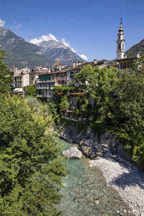 Mera River Near By Church Of Santa Maria In Town Against Sky