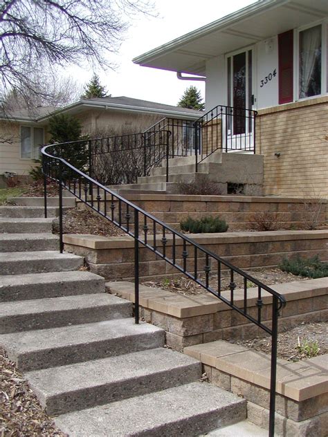 You can discover more aluminum railing color options here. Curved iron step railing | Railings outdoor, Iron railings outdoor, Outdoor stair railing