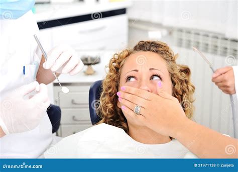 Teeth Checkup At Dentists Office Dentist Examining Girls Teeth Stock Image