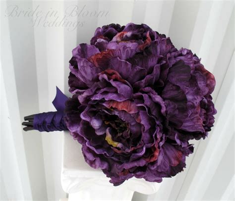 peonies are the flower of riches and honor this purple silk peony wedding bouquet is the