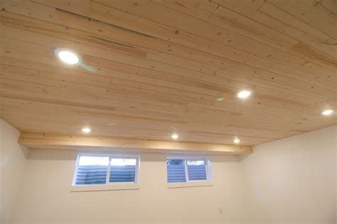 How To Install A Whitewashed Knotty Pine Wood Plank Ceiling Home Feature