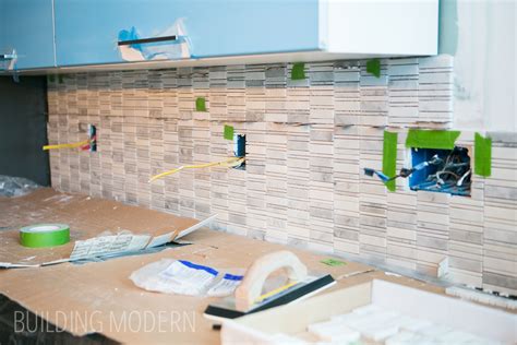 How to install a tile backsplash clean and prep the wall How to install a Carrara marble mosaic tile backsplash, part 1