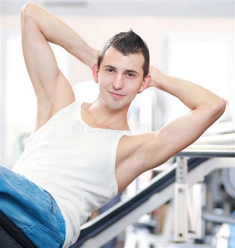 Powerful Muscular Man Lifting Weights In Gym Stock Image Image Of