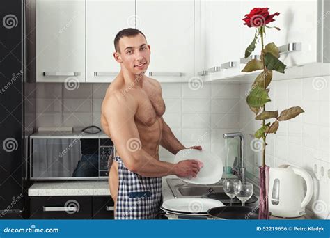 Bodybuilder Washing Dishes Stock Photo Image