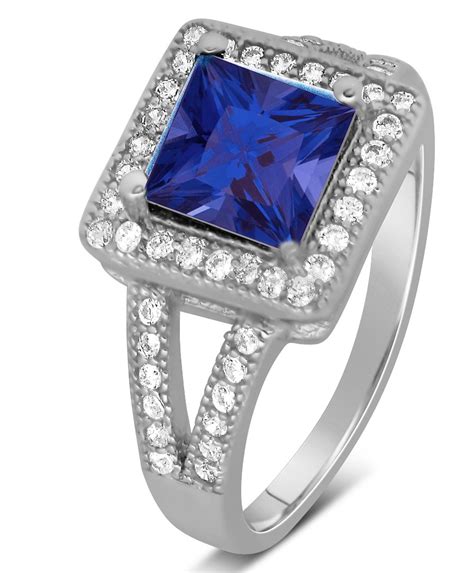 Using stunning 18k yellow gold designs, we help this to sparkle and shine on the finger to help spread. Designer 2 Carat Princess cut Blue Sapphire and Diamond ...