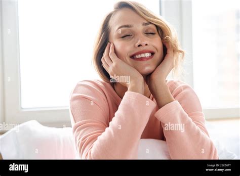 Image Of A Pretty Happy Smiling Optimistic Young Woman Posing Indoors
