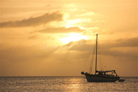 Yellow Sunset With Sailboat Stock Image Image Of Horizon Caribbean