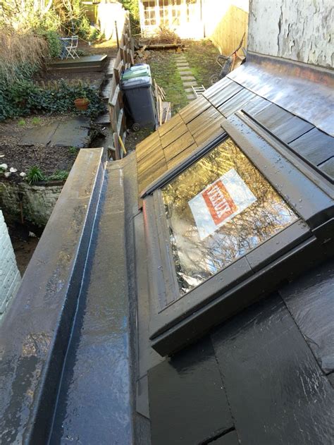 About our box gutters service. Small slated roof with Velux window and GRP box gutter ...