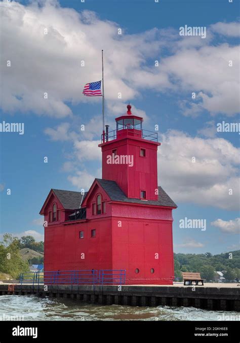Big Red Lighthouse At Holland Harbor In Holland Michigan With American