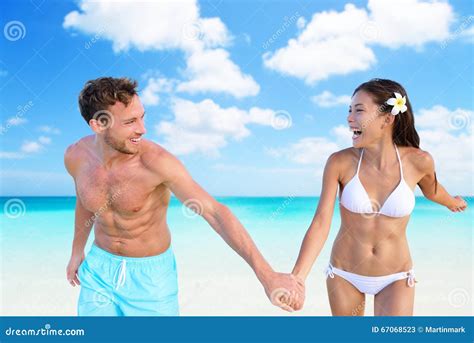 Beach Vacation Fun Couple In Bikini Swimwear Stock Image Image Of