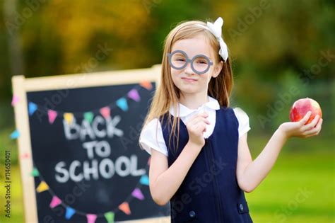 Cute Little Schoolgirl Feeling Excited About Going Back To School Stock