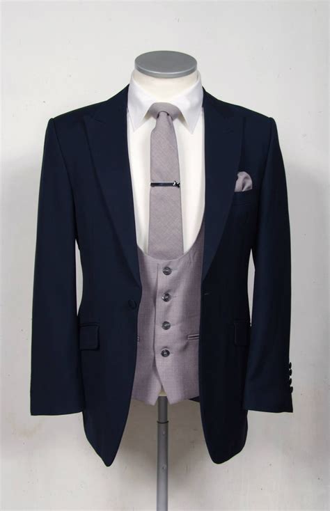 Tweed suits or formal wear and mother of the bride from fineattire boutique. Royal blue slim fit suit with ascot grey scooped waistcoat ...