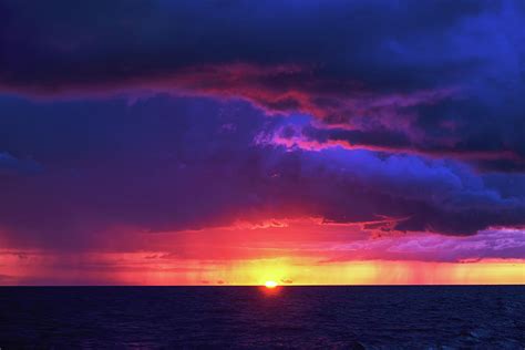 Natural Purple Color Sunset Or Sunrise Sky Over Stormy