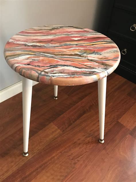 Pencils in a mug on a wooden table. Pink "Marble" Resin Pour Painted Table Top with Natural ...