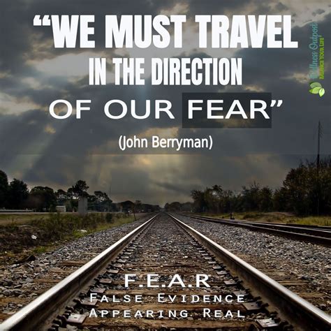 A Train Track With The Words We Must Travel In The Direction Of Our Fear