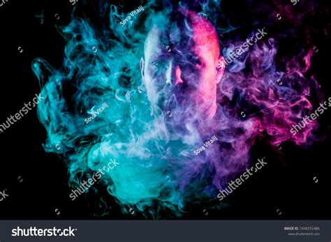 Young Man Exhales Cloud Colored Smoke Stock Photo 1048372486 Shutterstock