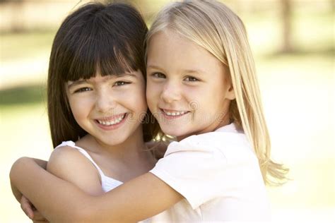 2 Young Girls Giving Each Other Hug Stock Photo Image Of Sister