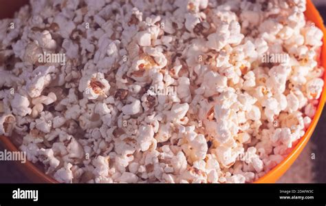 Fresh Hot Popcorn Lies In An Orange Bowl Cinema Pop Corn Background