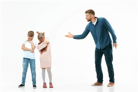 Free Photo Angry Father Scolding His Son And Daughter At Home