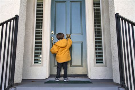 Child Knocking On Door Stock Photos Pictures And Royalty Free Images