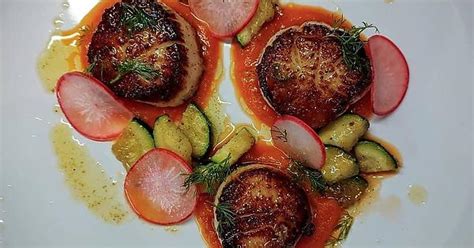 Seared Scallops On Pureed Carrots With Sauteed Zucchini And Pickled