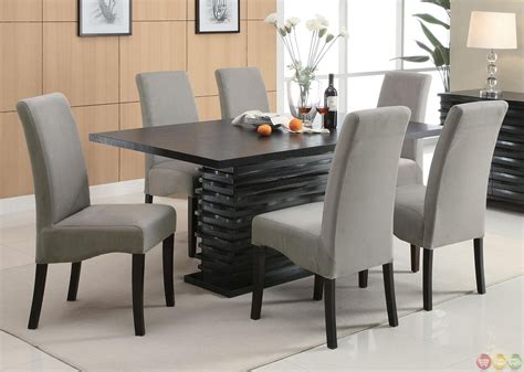 When it comes to dining rooms, gray is a tone that can either take the spotlight or act as an accent color to more powerful hues, depending on the shade. Stanton Semi Formal Gray 7 Piece Dining Room Furniture Set