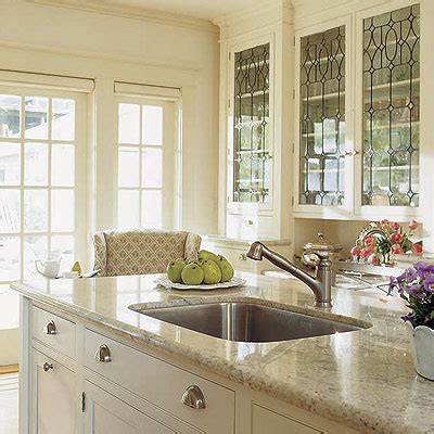 There are so many ways you can enhance your kitchen cabinets without tearing them down and totally this provides a wonderful new look and isn't nearly as expensive as replacing the cabinets in their entirety. Leaded Glass Cabinets - Traditional - kitchen