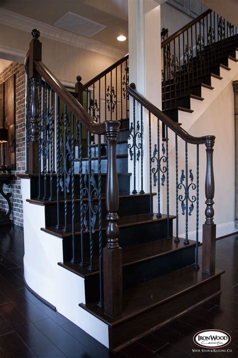 This Staircase Uses High Quality Wrought Iron Balusters To Create A