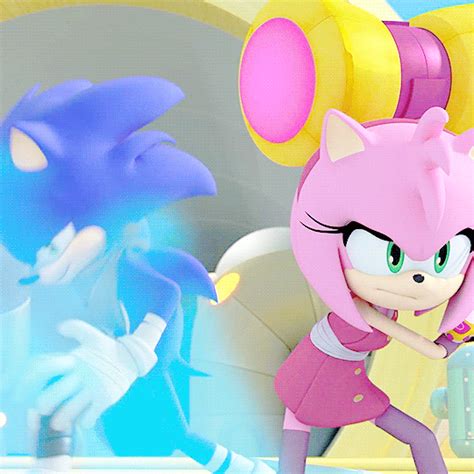 Sonic The Hedgehog And Shadow The Hedgehog Are Fighting In An Animated Video Game