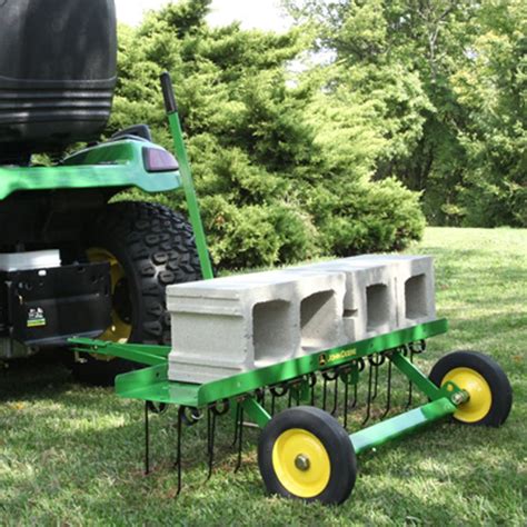 How to use a pull behind lawn dethatcher. John Deere 40-inch Tow-Behind Dethatcher - LP42107