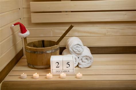 Premium Photo Sauna Towels Candles Are Burning And A Calendar For December 25 A Wooden