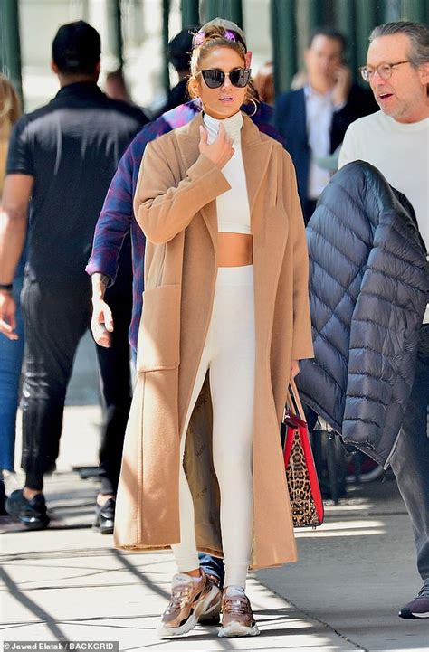 Jennifer Lopez Flashes Her Flat Midriff In Turtleneck Crop Top With