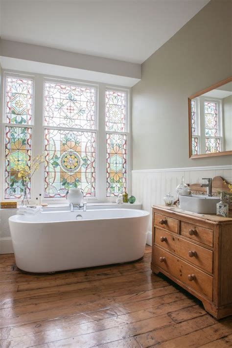 A mix of ann sacks surfaces, including a pebble wall covering, brings a warm feel to a guest bath of an aspen, colorado, home which was renovated by stonefox architects. Gorgeous Victorian Bathroom Design Ideas | Maison Valentina Blog