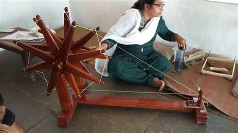 Spinning Cotton By Hand On A Spinning Wheel Charkha Spinning Cotton