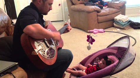 Baby Soothed By Daddy Playing Guitar Youtube