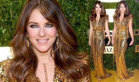 Elizabeth Hurley 54 Dazzles In Plunging Gold Dress At Fashion Gala In