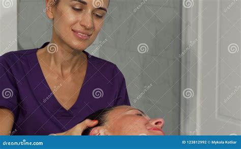 Young Happy Female Therapist Giving Massage To A Client Stock Footage