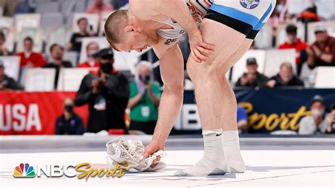 Why Do Wrestlers Leave Their Shoes On The Mat With World Champion